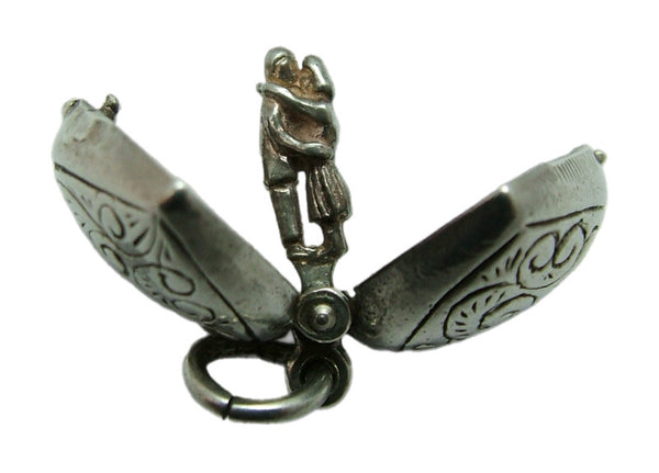Vintage 1970's Silver Opening Heart Charm Couple Cuddling Inside Silver Charm - Sandy's Vintage Charms